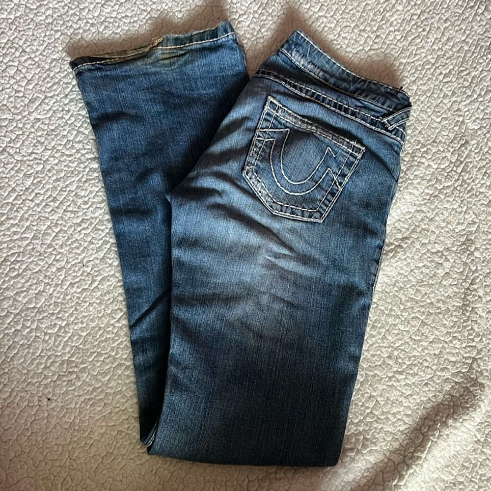 Bootcut jeans, they have been used and they do have wear and tear at the bottom
